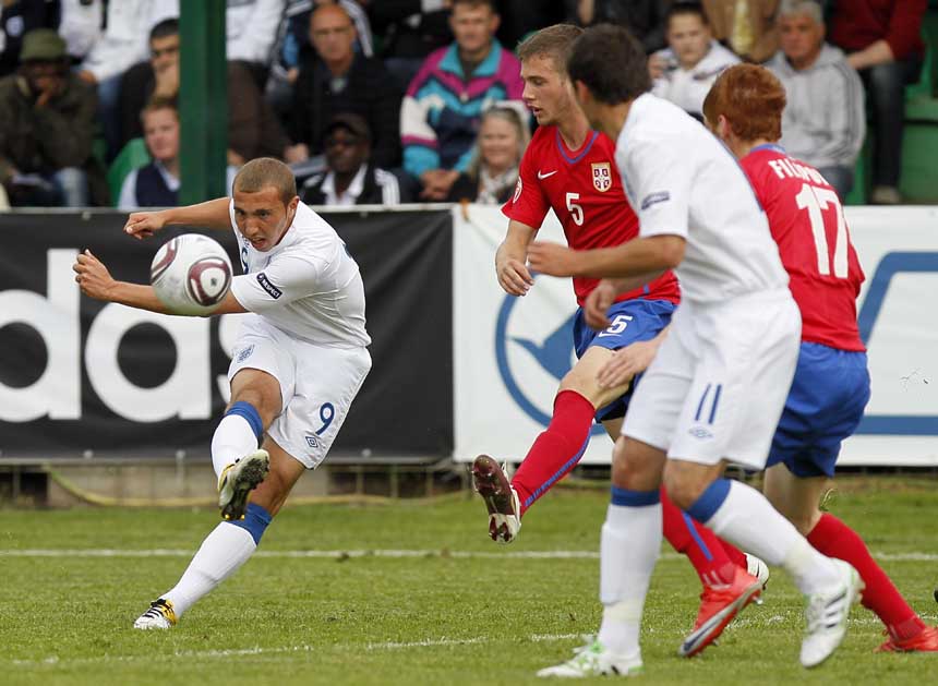 Hallam Hope curls home a beauty against Serbia.